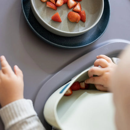 Silikonový bryndák s kapsou Pistachio