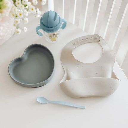 Silikonový bryndák s kapsou Dots šedý